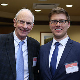 Alumnus and student at scholarship luncheon