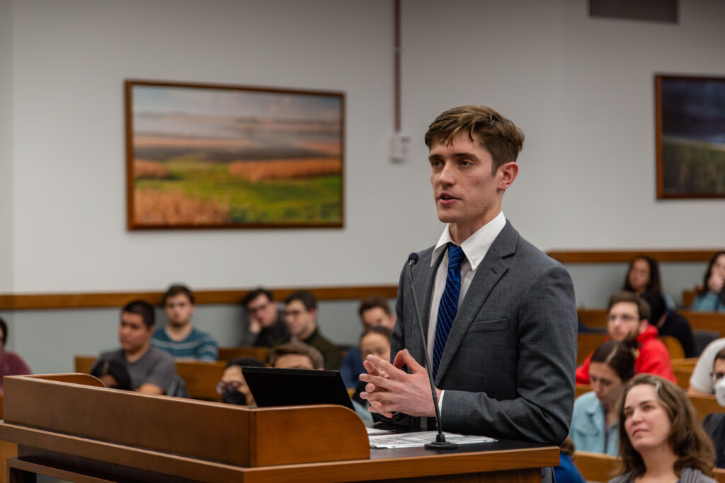A male student participates in a moot court competition