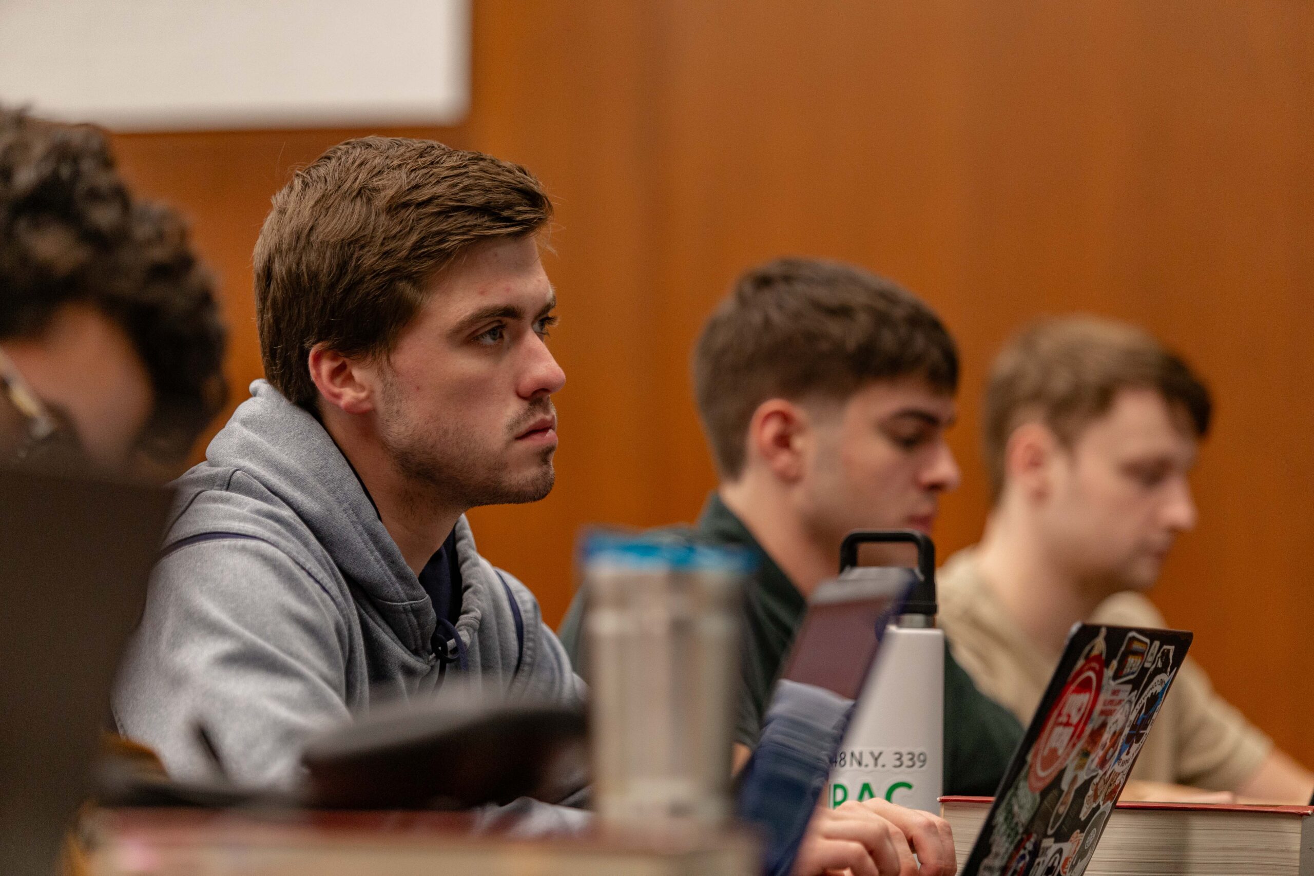 Students sit in a classroom