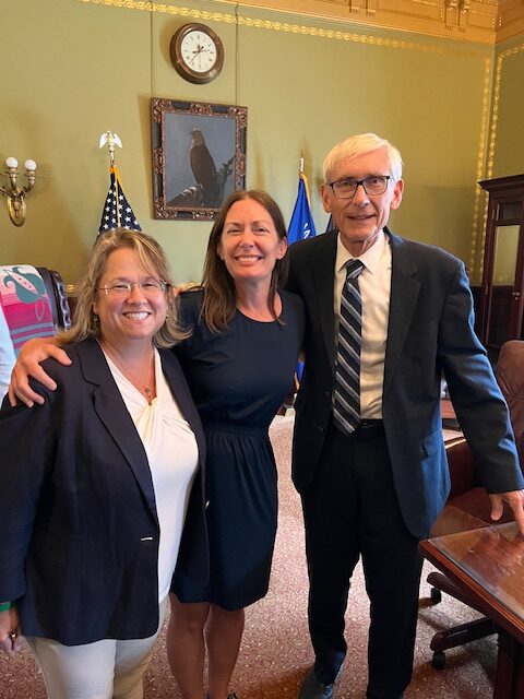 Professor Robin Fretwell Wilson poses with Wisconsin Governor Tony Evers and patient advocate Sarah Wright.